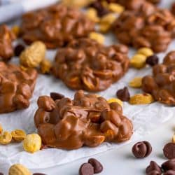 close up of peanut clusters on parchment paper