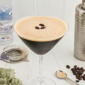 espresso martini with shaker in background