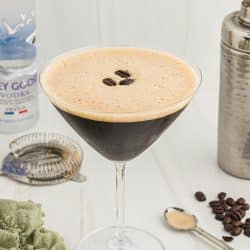 espresso martini with shaker in background