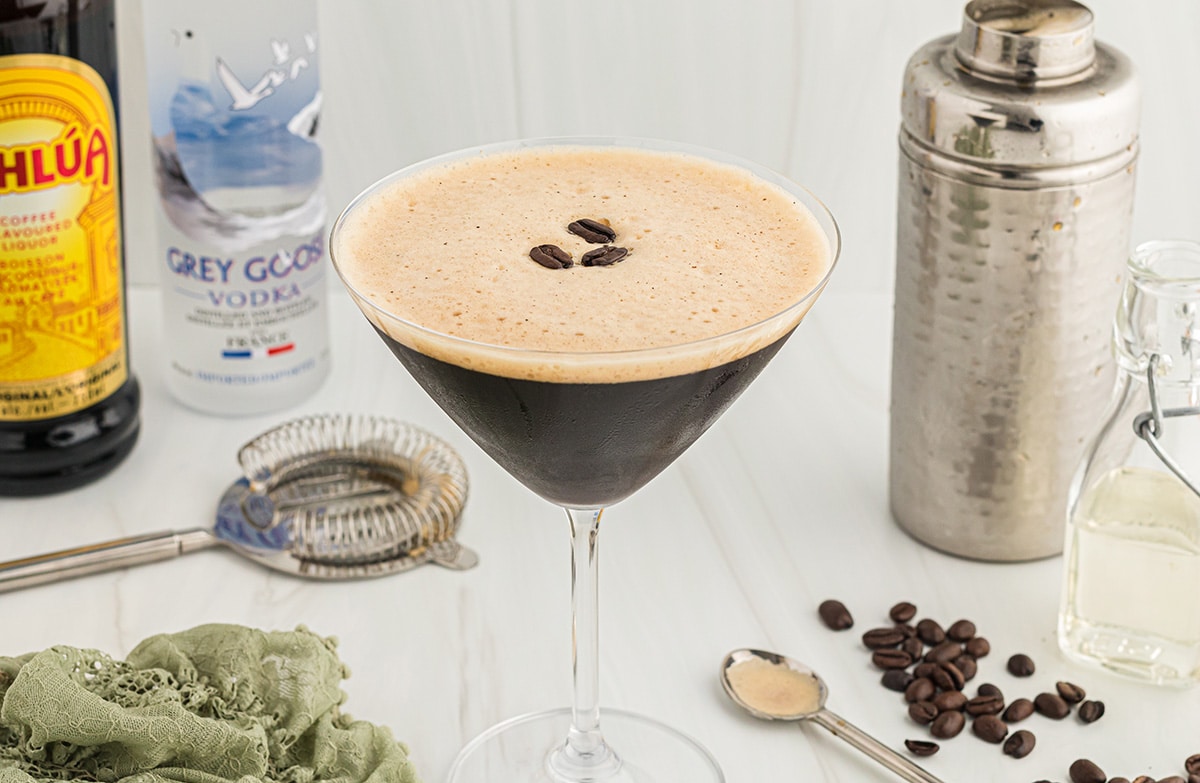 espresso martini with shaker in background