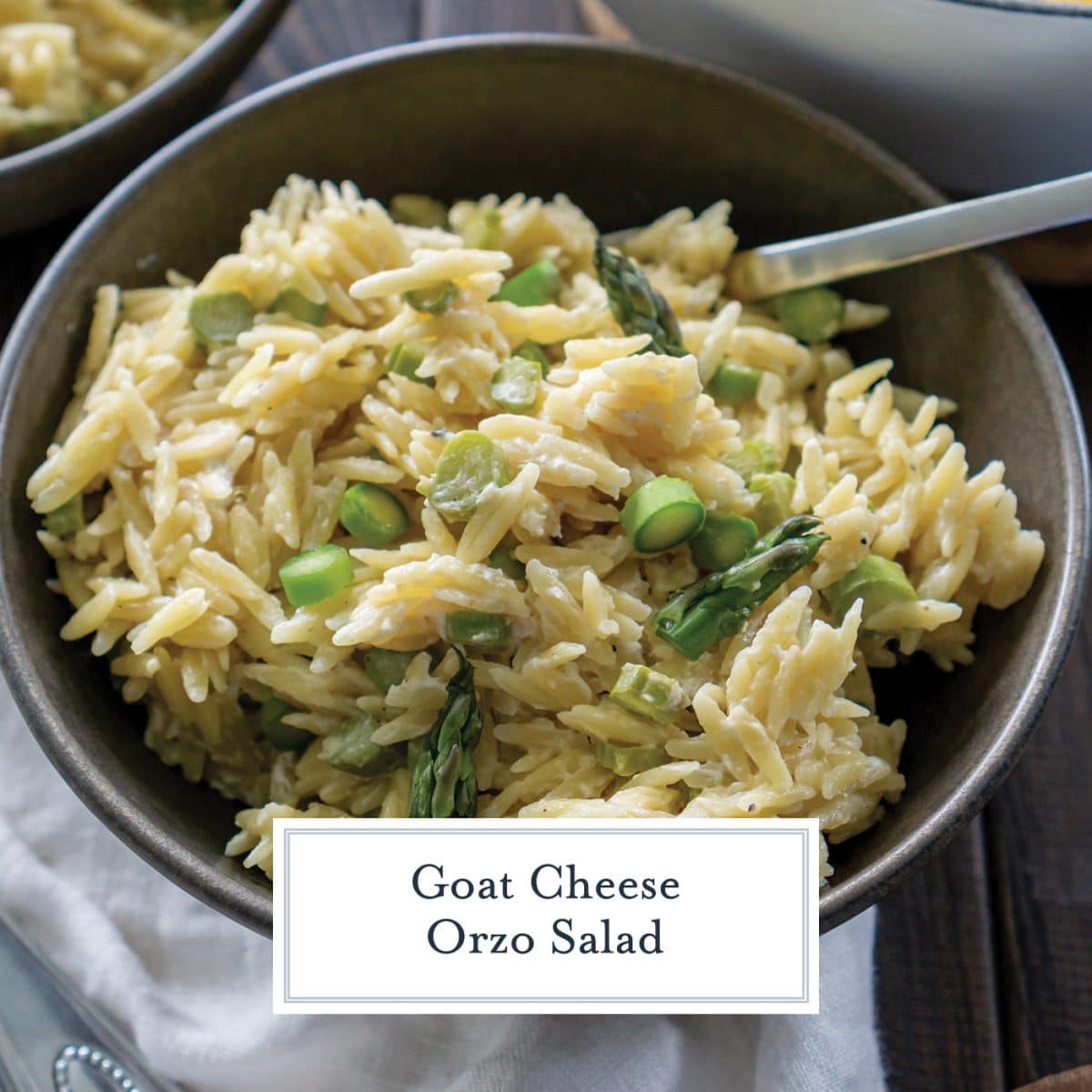 bowl of orzo salad with text overlay for facebook