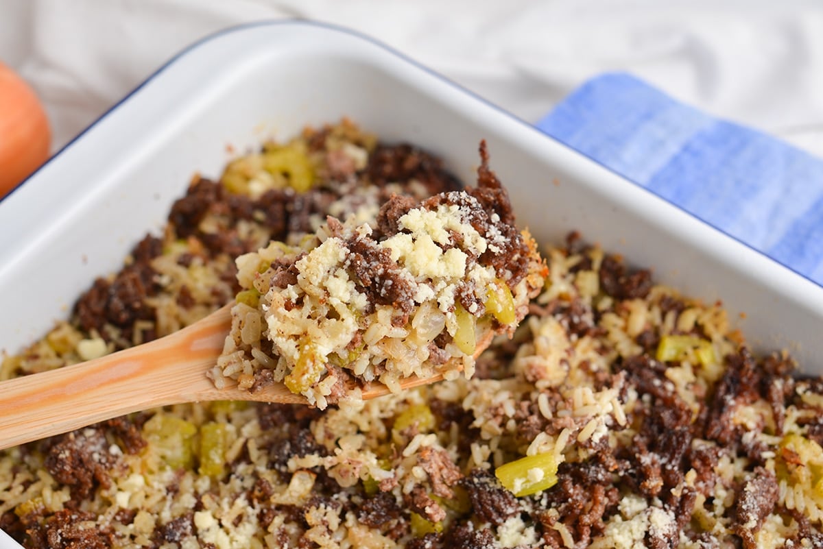 rice dressing on a wooden spoon