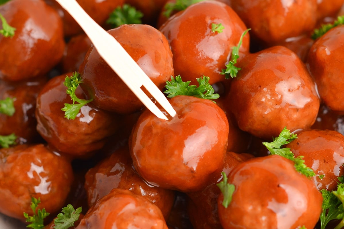 close up of a wood toothpick in a meatball