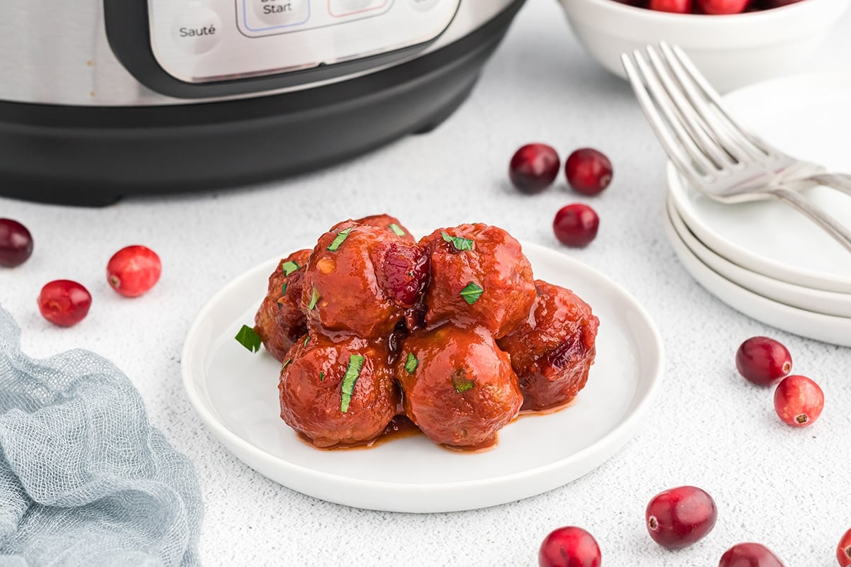close up of plate of cranberry meatballs