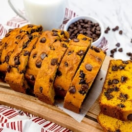 sliced pumpkin bread on a cutting board