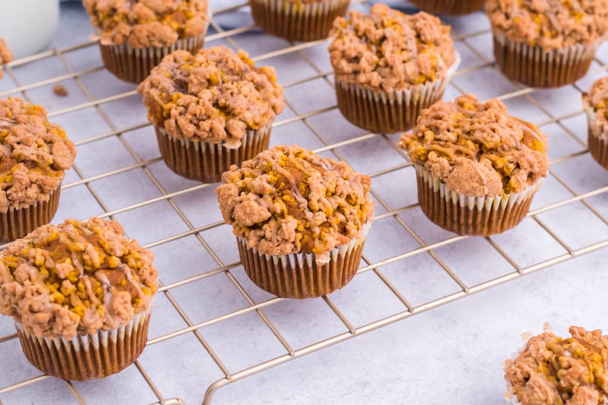 angled shot of muffins on a cooling rack