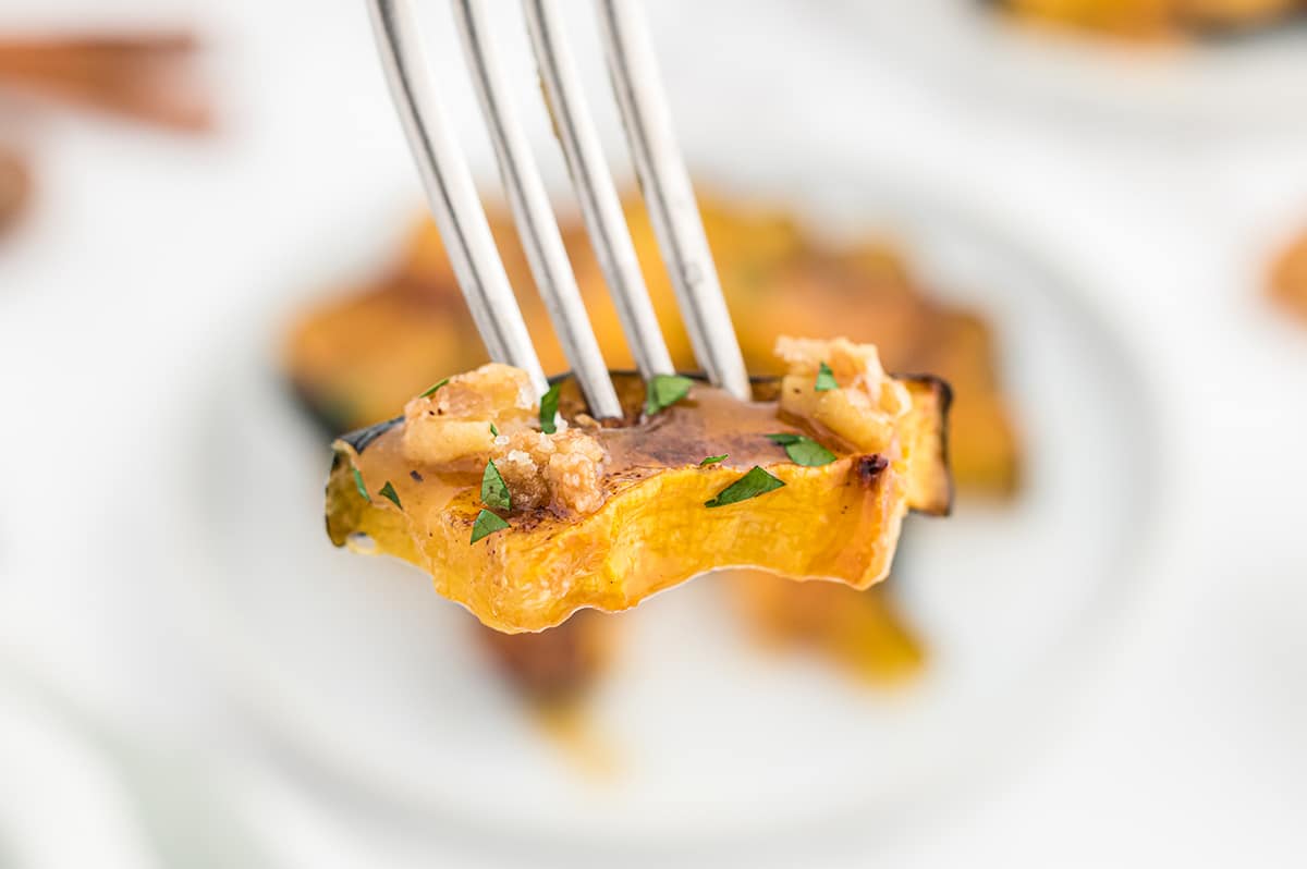bite of acorn squash on a fork
