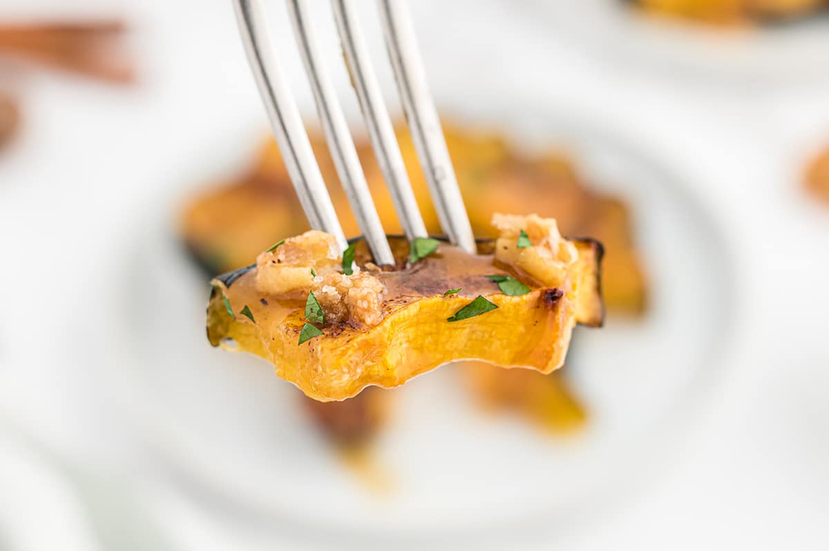 bite of acorn squash on a fork