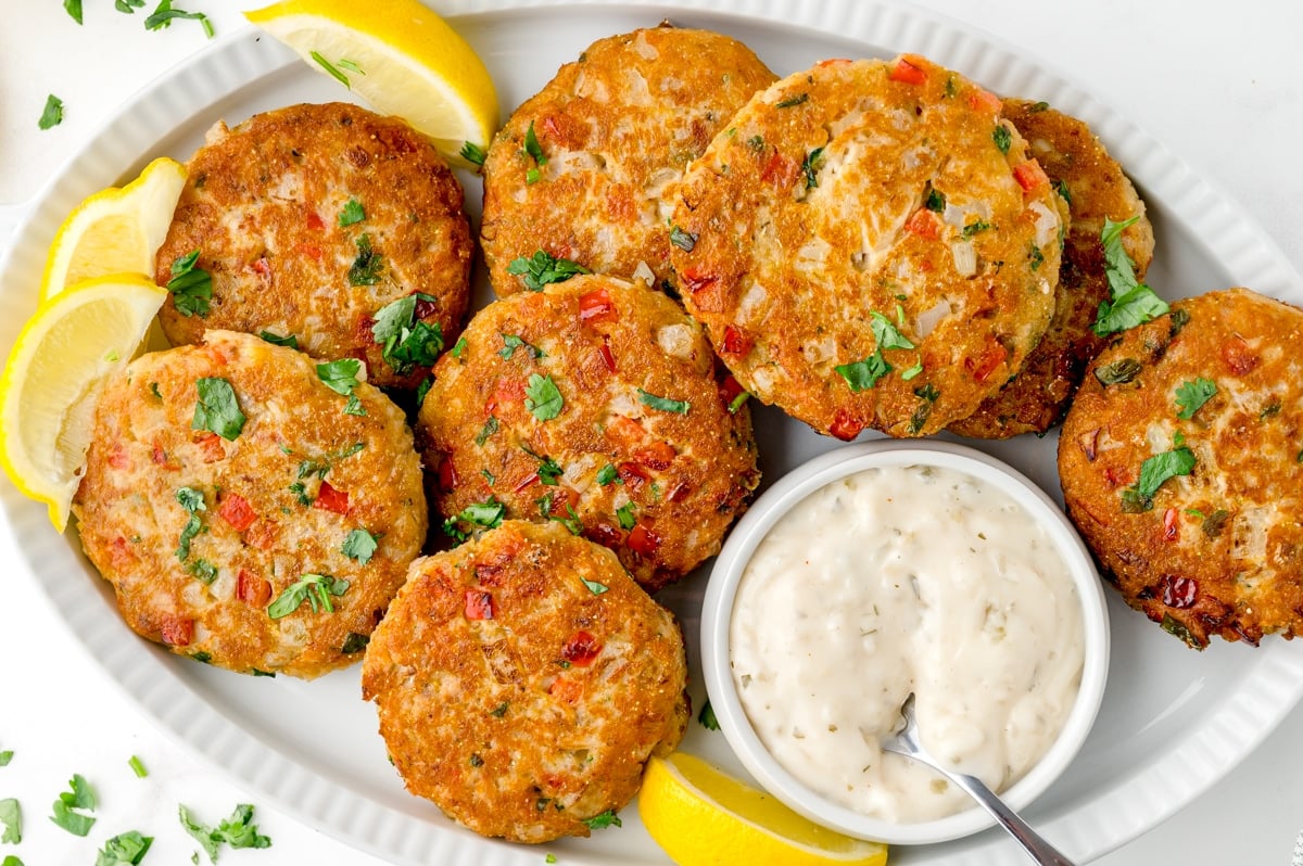 plate of salmon croquettes with dipping sauce