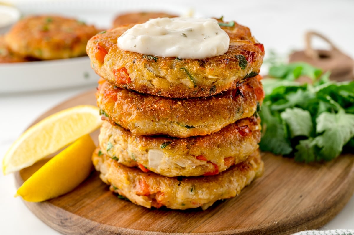 stack of salmon cakes with lemon slices