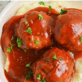 close up of meatballs in bbq sauce