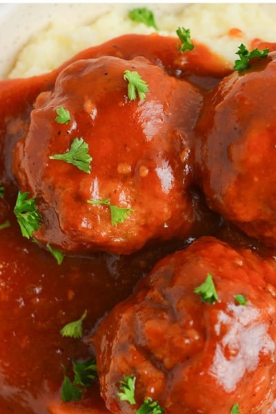 close up of meatballs in bbq sauce