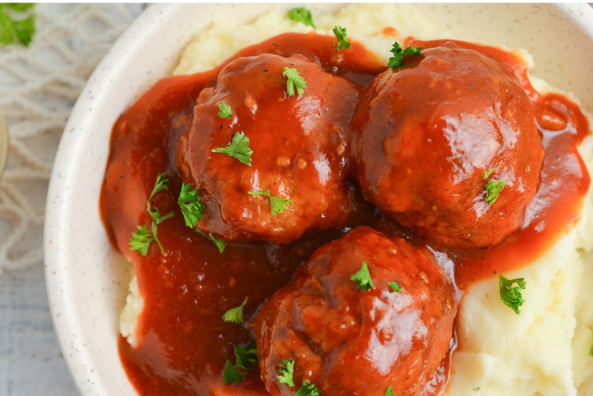 close up of meatballs in bbq sauce