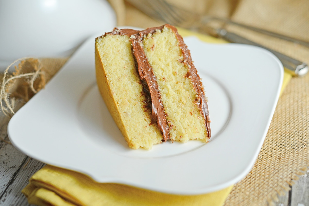 slice of layer cake on a white serving plate