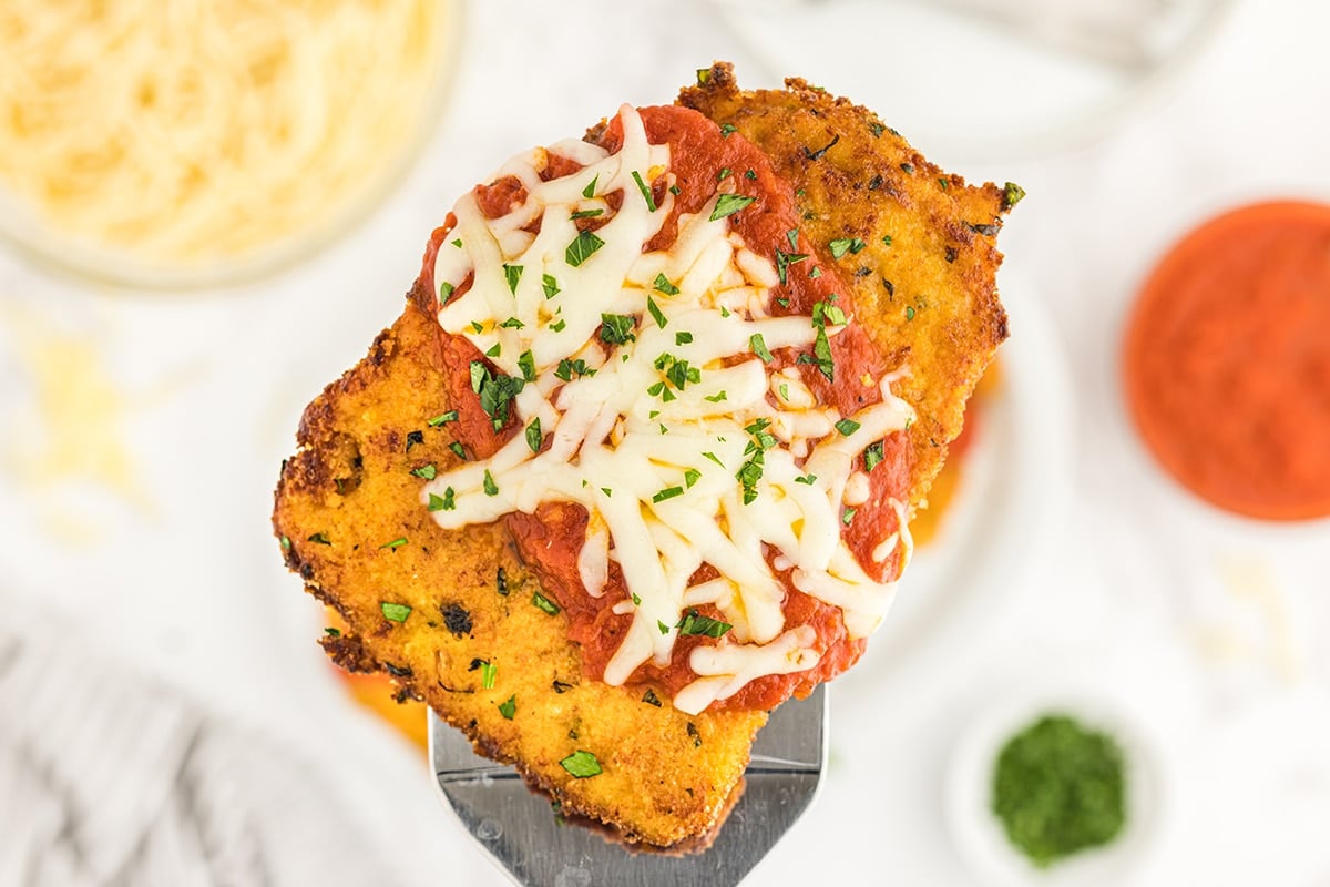 breaded chicken on a spatula