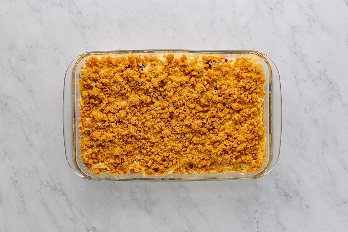 overhead shot of crumble topping added to cranberry coffee cake