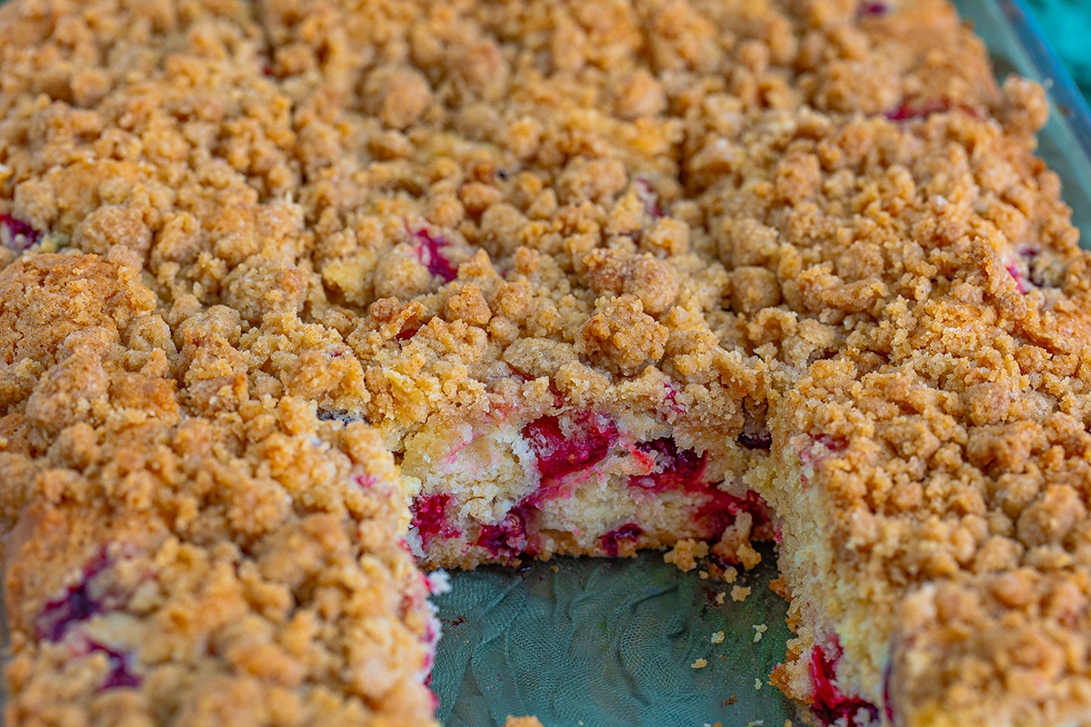 slice taken out of cranberry coffee cake