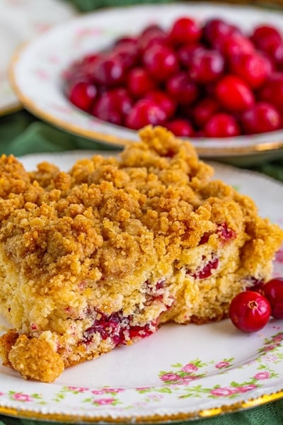 close up of slice of cranberry coffee cake