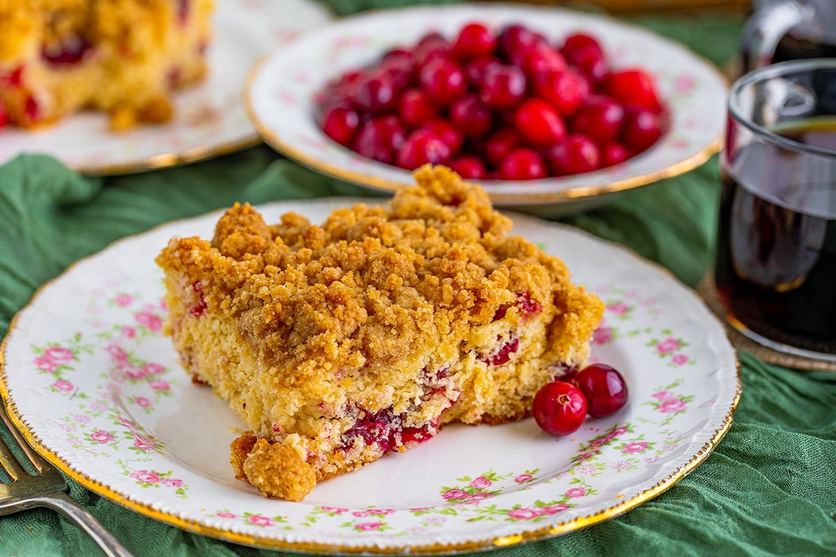 close up of slice of cranberry coffee cake