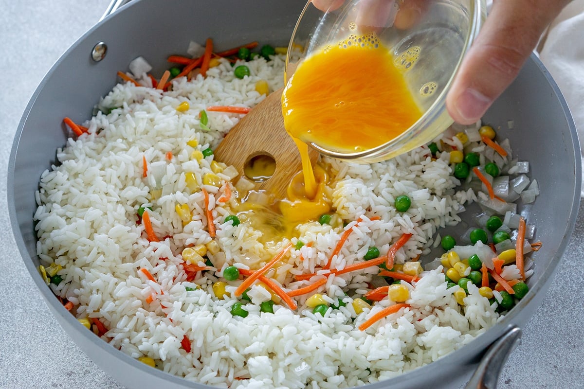 egg poured into fried rice