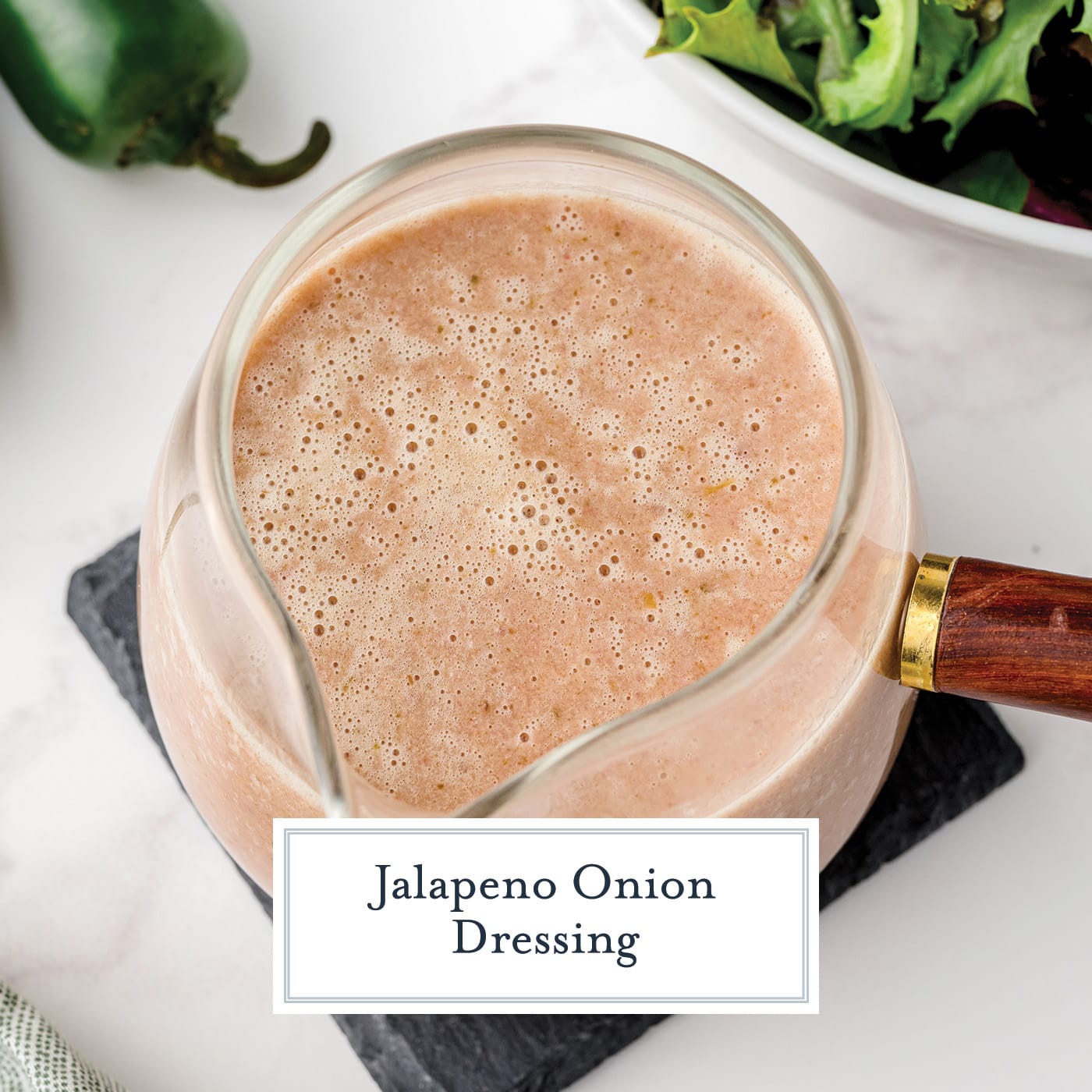 overhead shot of jalapeno onion dressing with text overlay for facebook