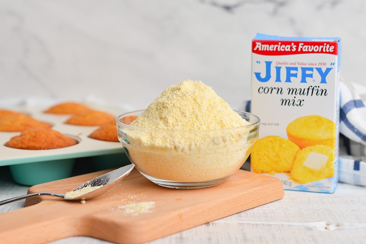 glass bowl of dry jiffy cornbread muffin mix