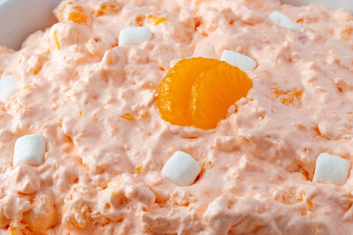 close up of oranges in fluff salad