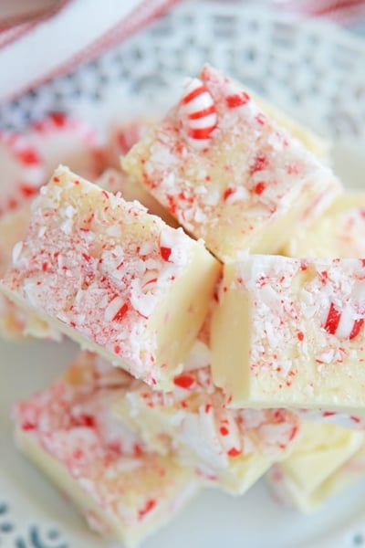 stack of easy peppermint fudge on a white plate