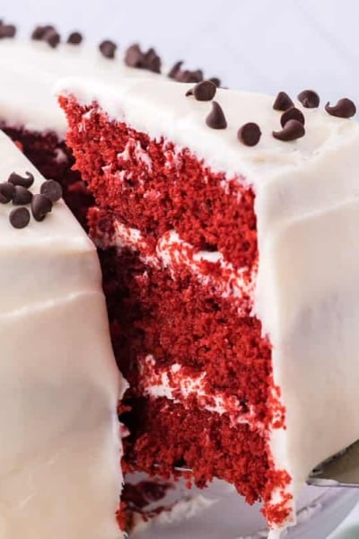 slice taken out of red velvet cake