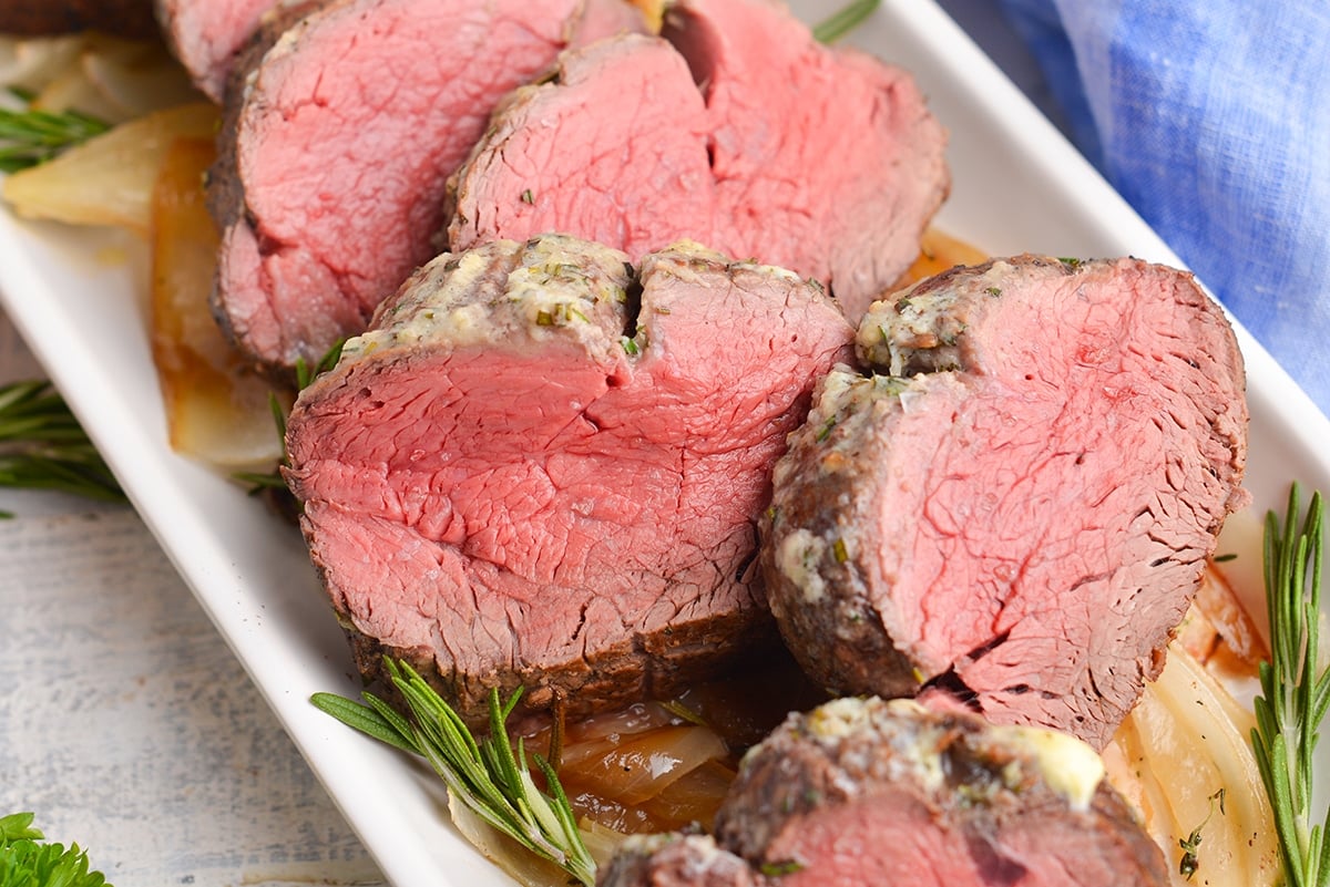 close up of sliced herb and garlic tenderloin