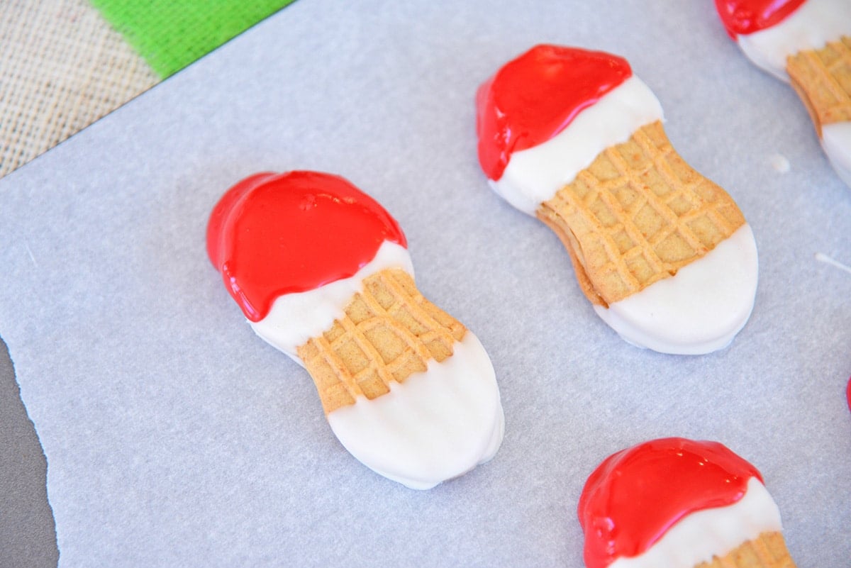 red and white dipped chocolate on cookies