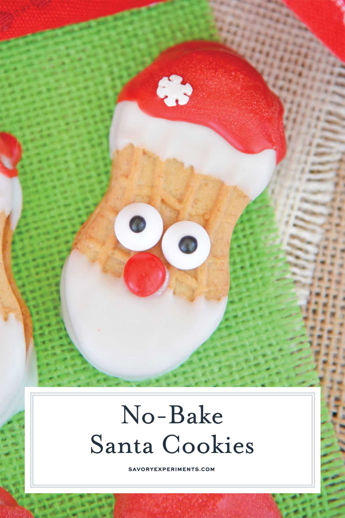 close up of a no-bake santa cookie with green background