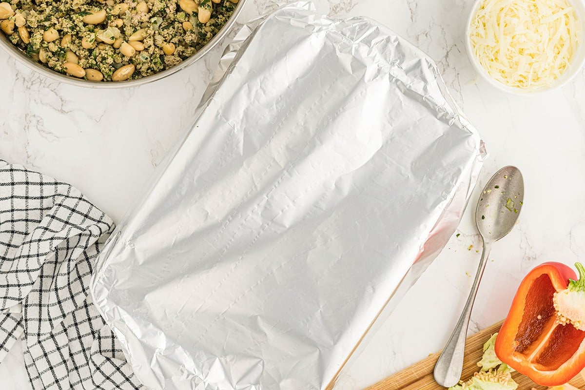 casserole dish covered with aluminum foil