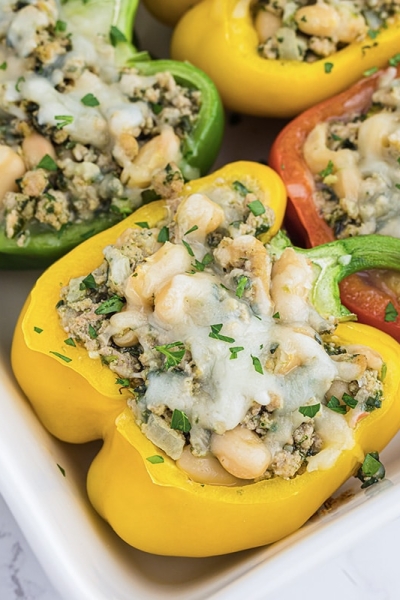 close up of a yellow bell pepper with ground turkey stuffing