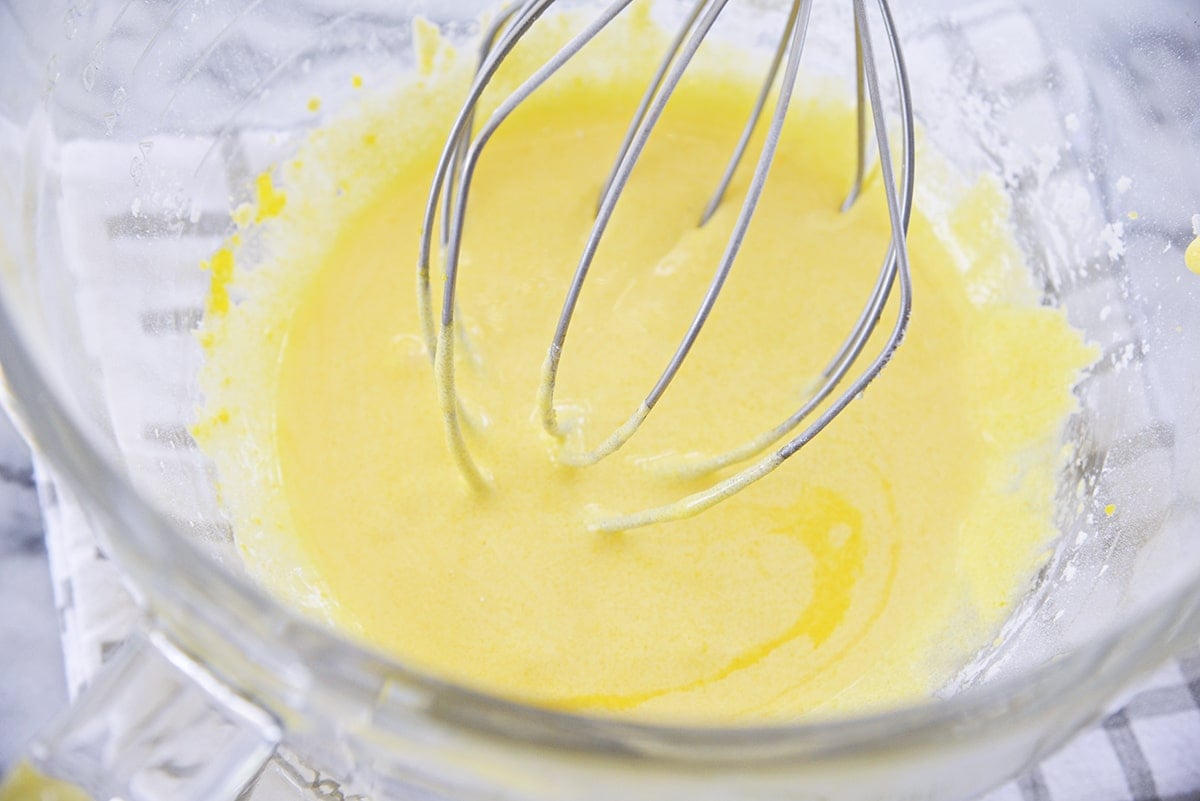 whisking and tempering vanilla custard