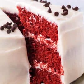 slice taken out of red velvet cake