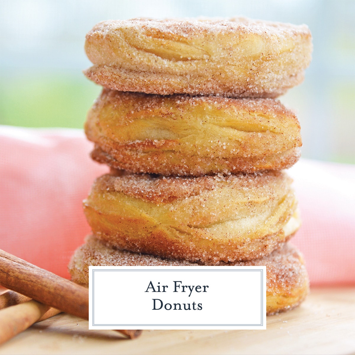 close up of cinnamon sugar donuts with text overlay