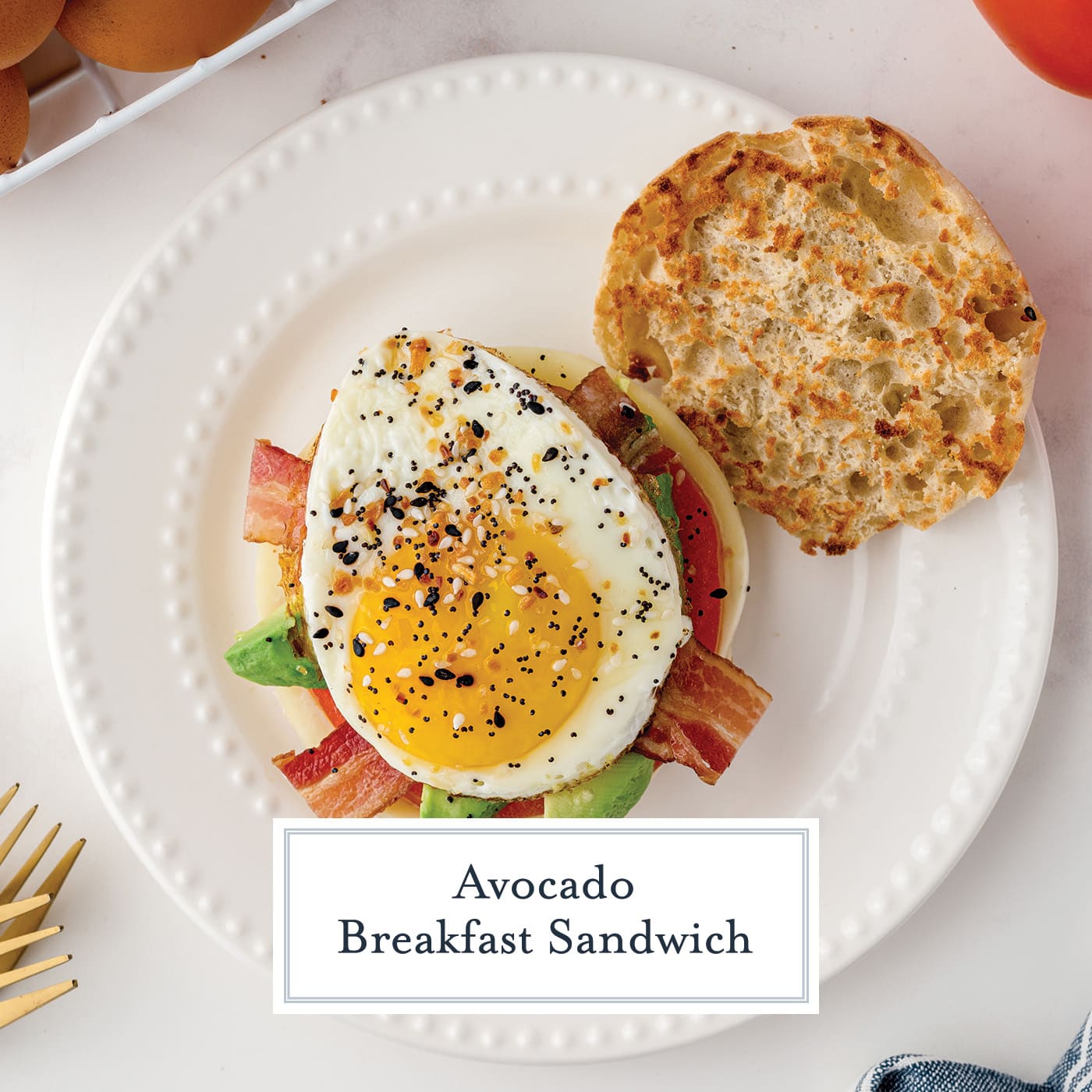 overhead shot of avocado breakfast sandwich with text overlay for facebook