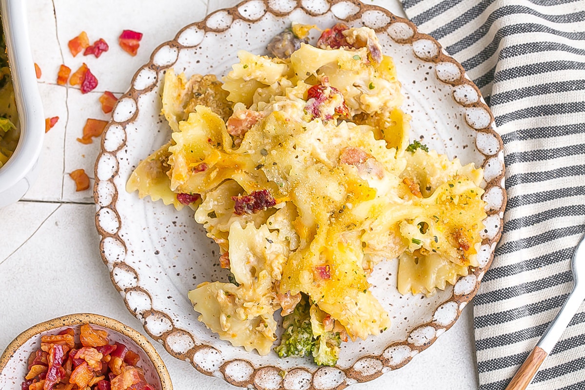 cheesy chicken casserole recipe on a small white plate