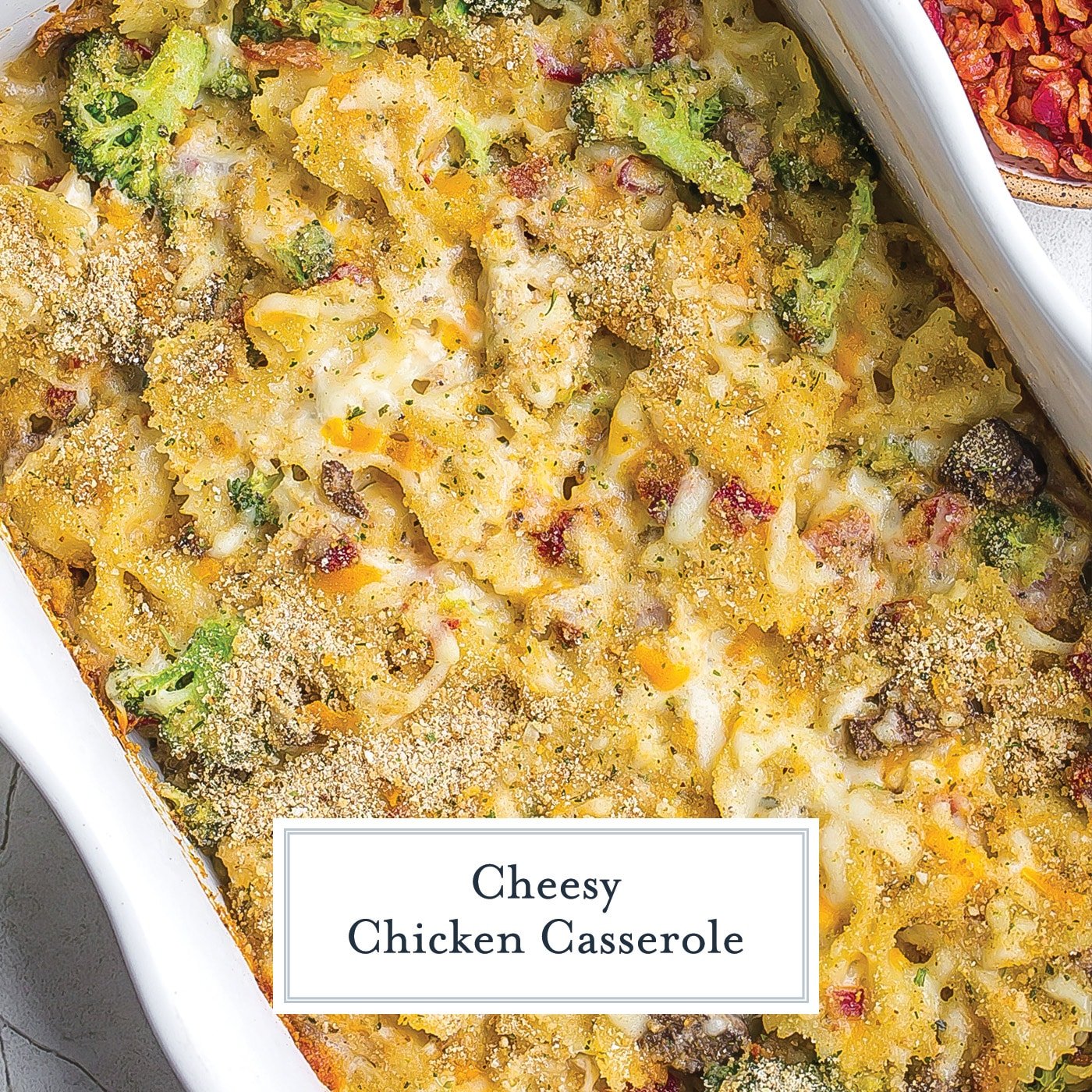 overhead of cheesy chicken casserole with text overlay