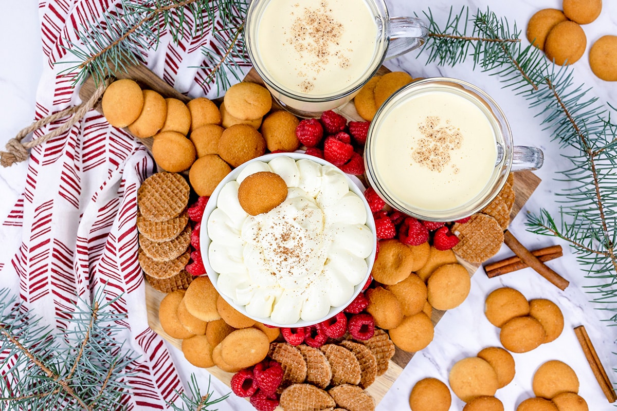 overhead of eggnog dip with dippers