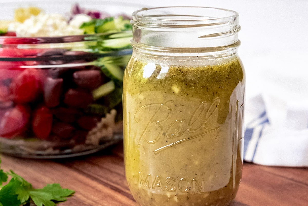 mason jar of greek salad dressing 