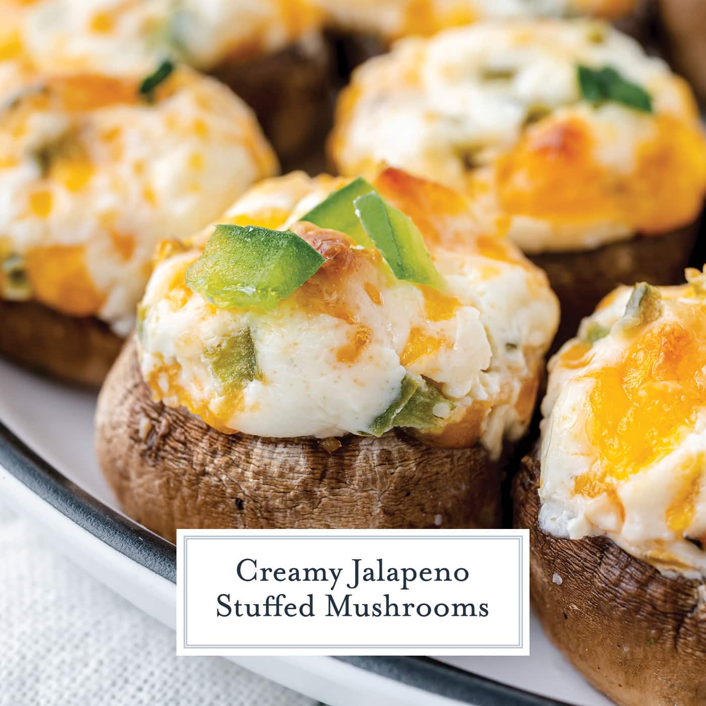 close up of jalapeno stuffed mushrooms with text overlay for facebook