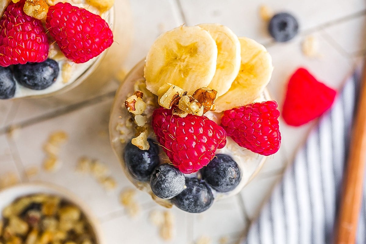 overhead shot of overnight oats topped with fruit