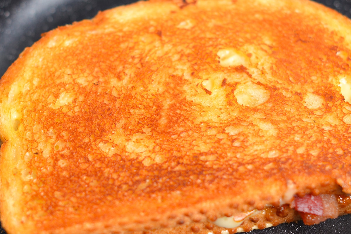 close up of browned bread on a grilled cheese sandwich