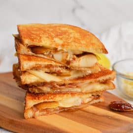 close up of grilled cheese sandwich with bacon and pears