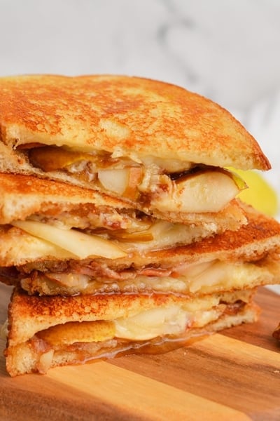 close up of grilled cheese sandwich with bacon and pears