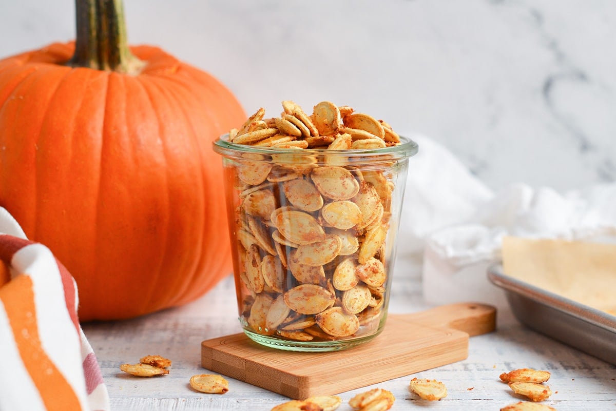 roasted pumpkin seeds in a glass jar