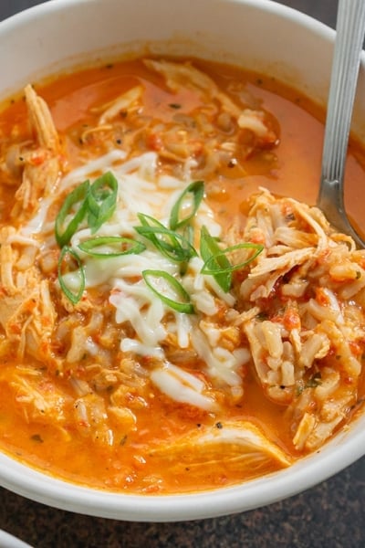 close up of roasted red pepper soup in a bowl