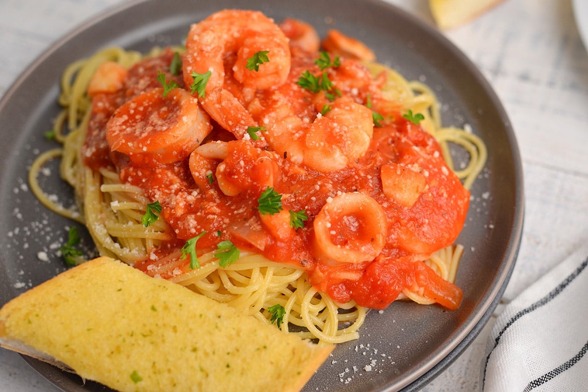 close up of spicy tomato sauce with seafood